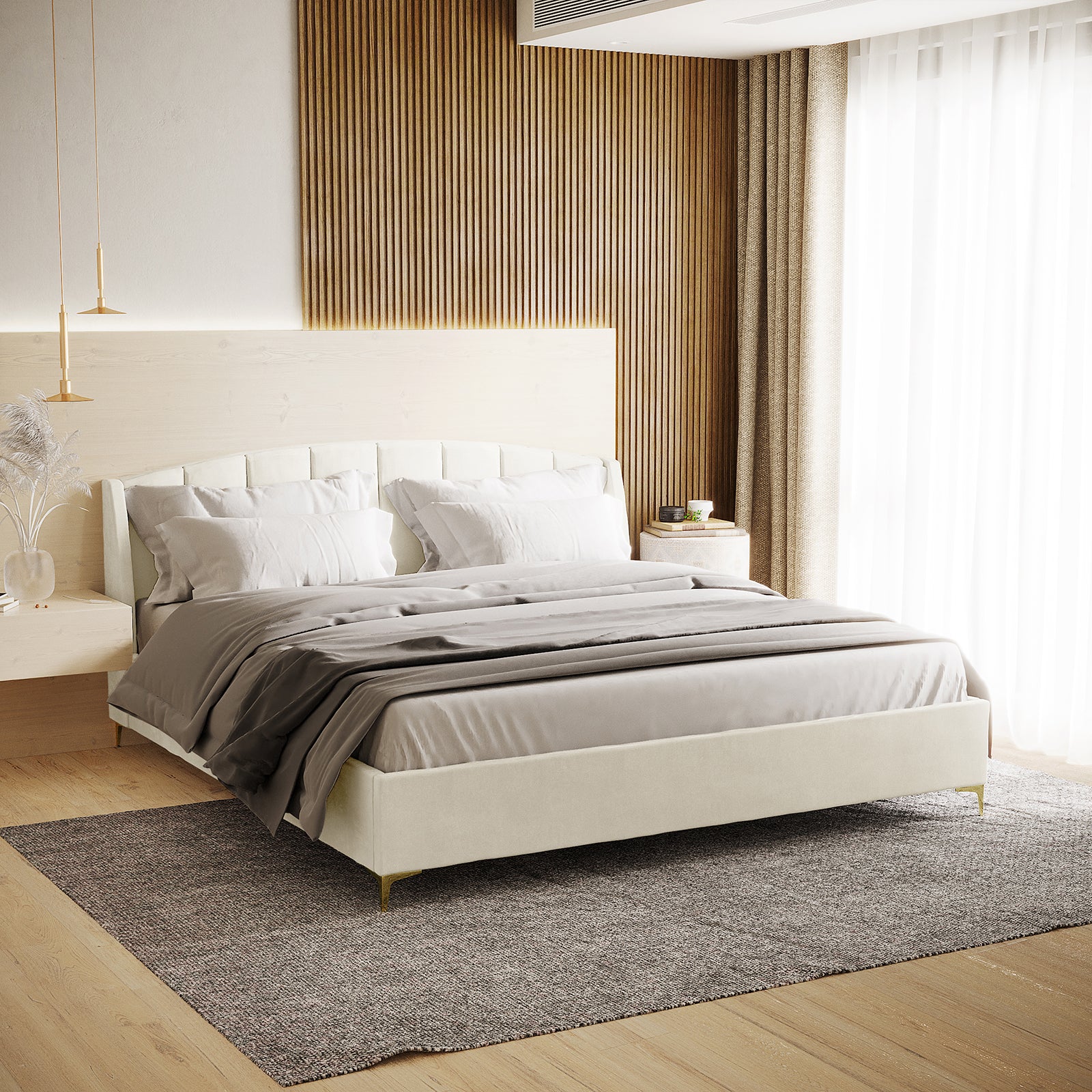 Lyra Velvet Bed Frame with Winged Headboard - Cream White King is shown with a tufted, padded headboard and gold chrome legs, displayed in a stylish bedroom setting with elegant bedding.