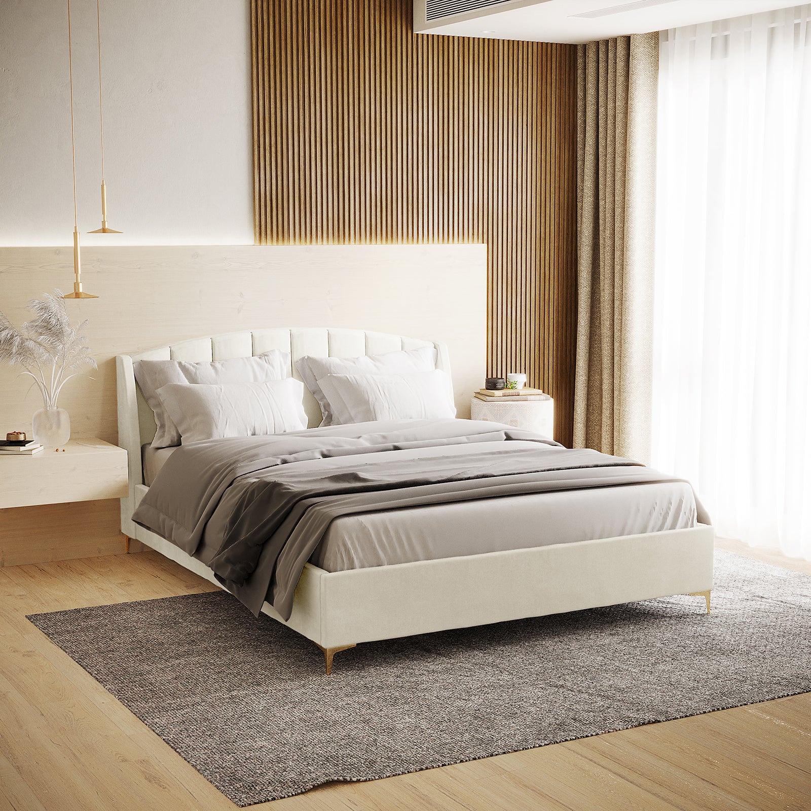 Lyra Velvet Bed Frame with Winged Headboard - Cream White Queen, featuring a tufted, padded headboard and gold chrome legs, creates a luxurious focal point in a bedroom setting.