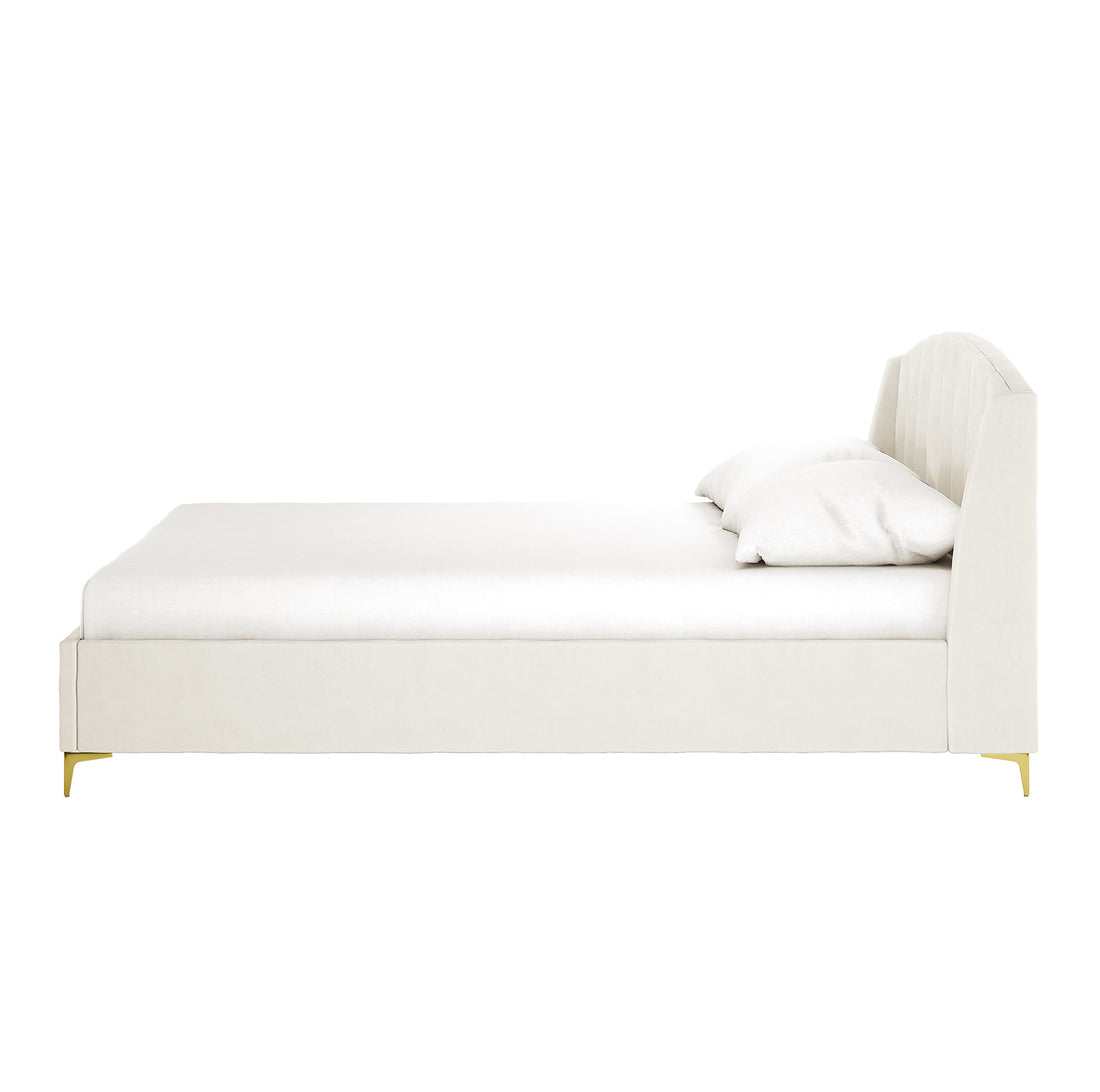Lyra Velvet Bed Frame with Winged Headboard - Cream White, featuring a tufted, padded headboard and gold chrome legs, enhancing the luxurious feel of a bed with soft velvet fabric.
