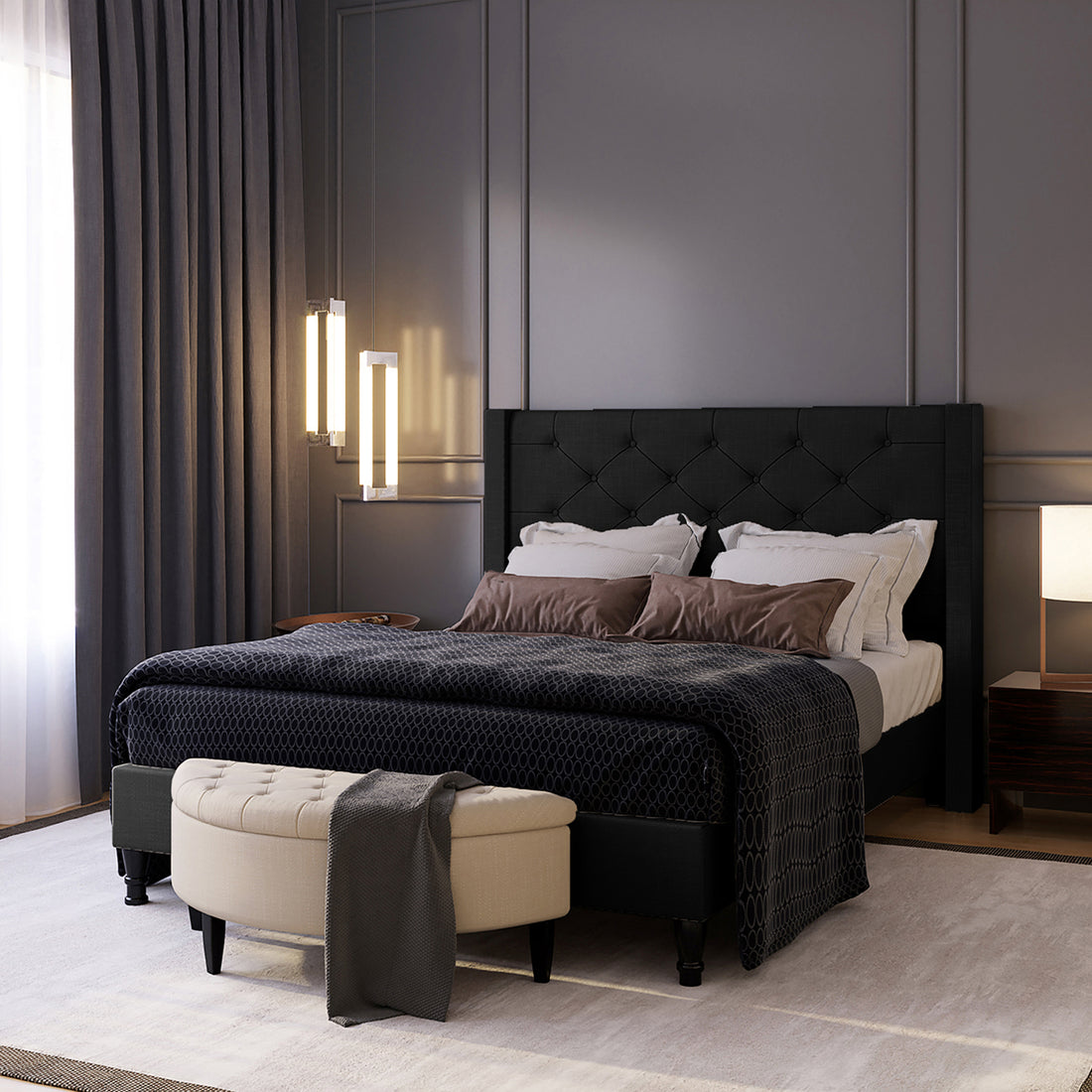 Maggie Double Winged Fabric Bed Frame – Black features a plush, deep-buttoned Chesterfield headboard, providing a sophisticated centerpiece for any bedroom. Sturdy frame design with elegant diamond tufting and timeless aesthetics.