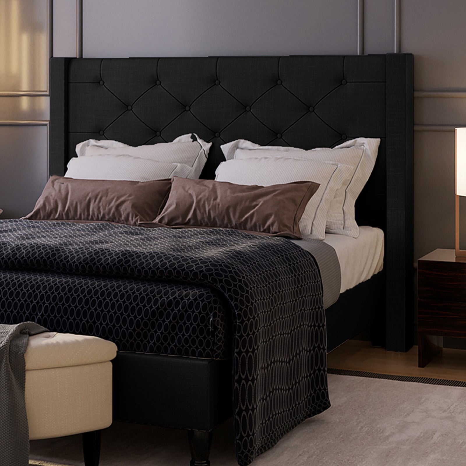 Maggie Double Winged Fabric Bed Frame – Black, featuring a luxurious deep-buttoned Chesterfield headboard with plush comfort and solid construction, displayed with a brown pillow on a bed.