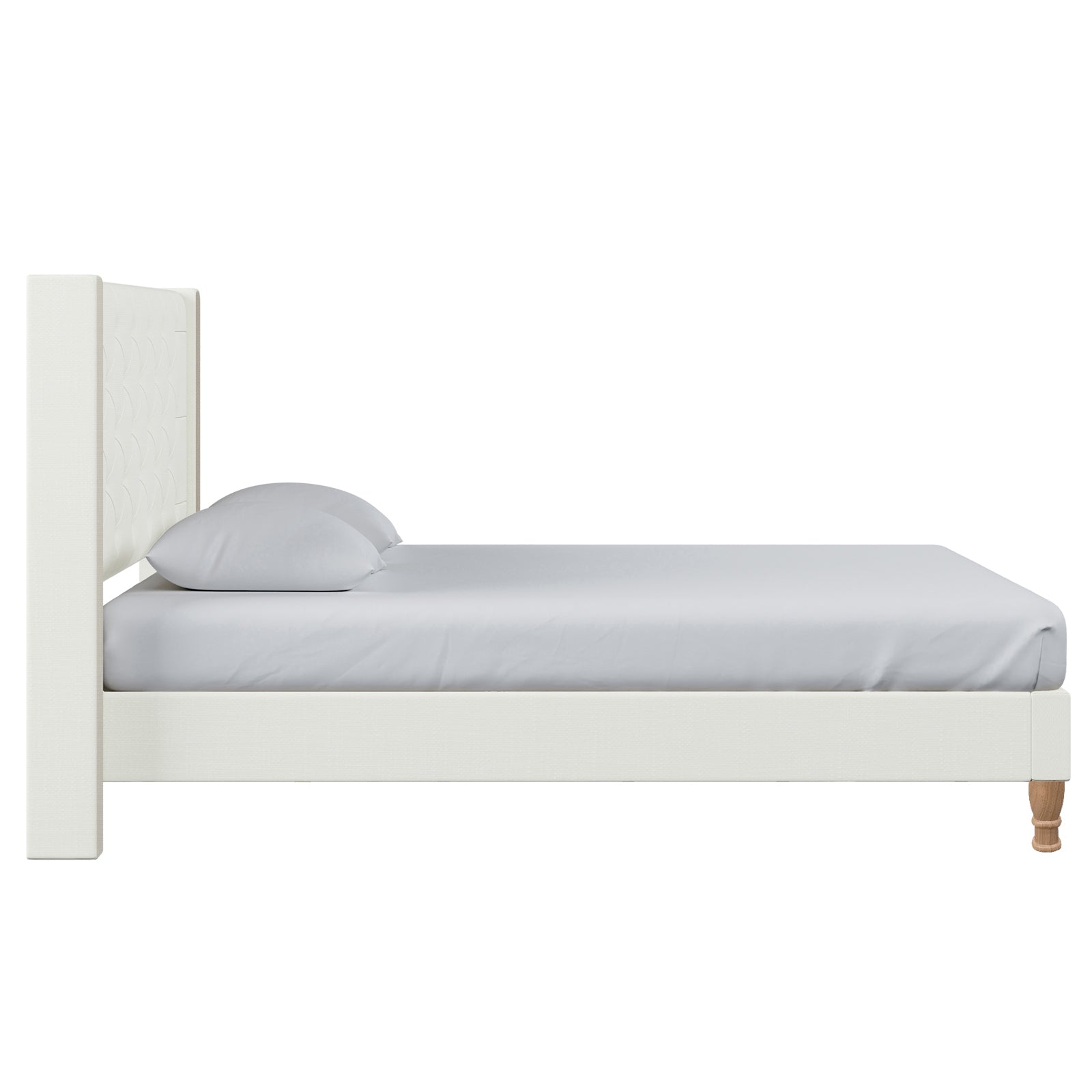 Maggie Queen Winged Fabric Bed Frame in Off White, showcasing a side-profile view with a tall, padded headboard, smooth fitted sheet, matching pillows, and natural wood legs against a white backdrop.