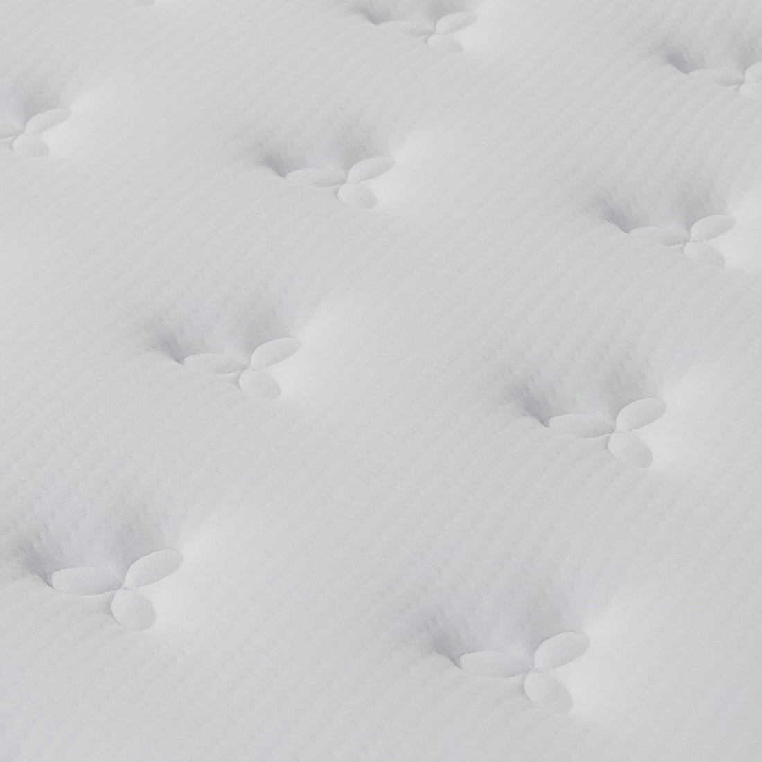 Close-up of the Antheia 32cm Medium Firm Euro Top Latex Memory Foam Spring Mattress – King, showcasing its quilted, tufted surface with stitched depressions, highlighting luxurious padding and plush knitted fabric cover.