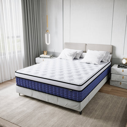Antheia Queen 32cm Euro Top Memory Foam Latex Mattress in Medium Firm displayed on a low gray platform, featuring a plush white top with navy-blue quilted sides, complemented by an upholstered headboard and white pillows.