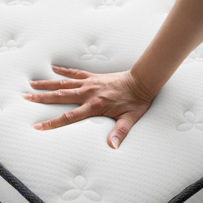 Hand pressing on the Antheia Queen 32cm Euro Top Memory Foam Latex Mattress in Medium Firm, showcasing tufted fabric and indentation, illustrating its plush, supportive Euro top design and pressure-relief features.