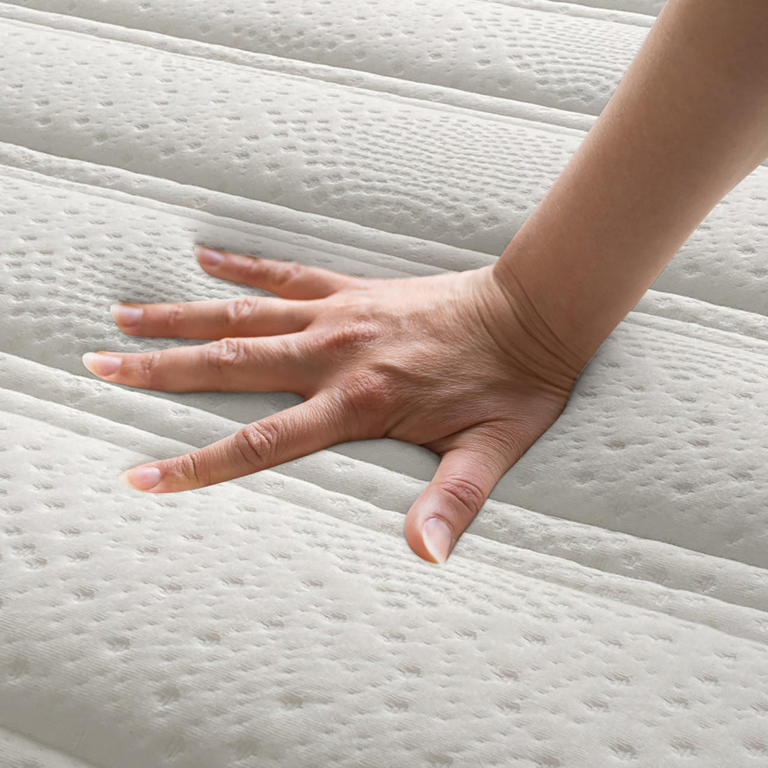 Delia Queen 28cm Medium Firm Euro Top Latex Mattress – White, showing a hand pressing the plush Euro top quilting, highlighting its luxurious cushioning and supportive nine-layer construction for ultimate comfort.