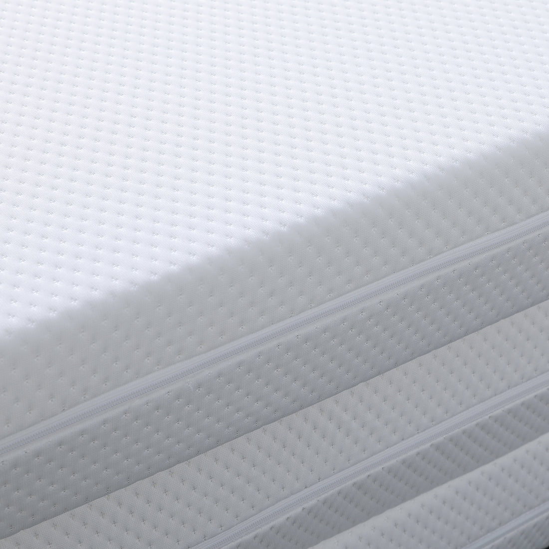 Close-up of the Flecter Foldable Foam Mattress - Queen, showcasing its textured fabric and detailed zipper, emphasizing its intricate pattern and craftsmanship.