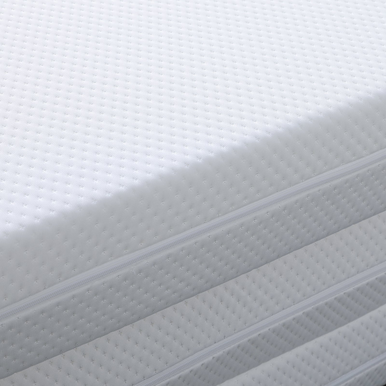 Close-up of the Flecter Foldable Foam Mattress - Queen, showcasing its textured fabric and detailed zipper, emphasizing its intricate pattern and craftsmanship.
