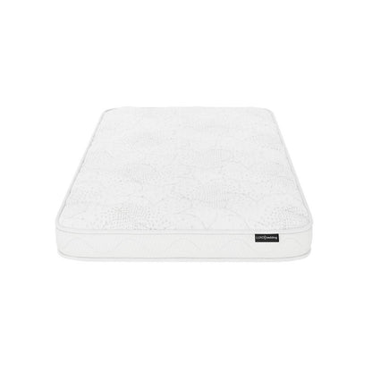 Gydas 10cm High-Density Foam Knitted Nursery Cot Mattress features a plain white, quilted top, and a Luxol Bedding label, showcasing its new, unmade state on a white background.