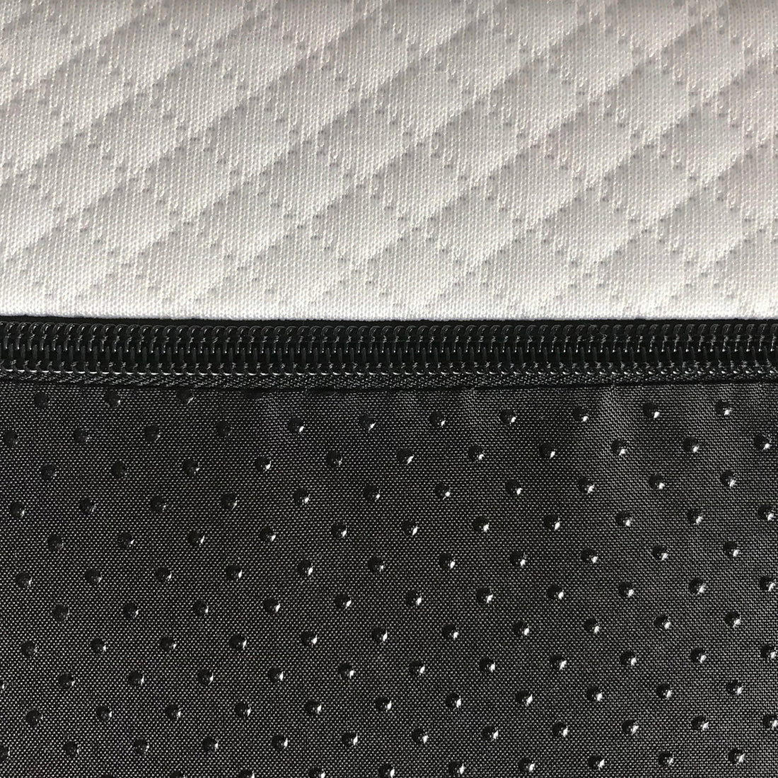 Luxo Junior 15cm Medium Firm Kids and Bunk Bed Mattress features a close-up of its durable, black and white abstract patterned fabric, showcasing its reinforced edges and breathable, machine-washable cover.