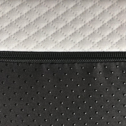 Luxo Junior 15cm Medium Firm Kids and Bunk Bed Mattress features a close-up of its durable, black and white abstract patterned fabric, showcasing its reinforced edges and breathable, machine-washable cover.