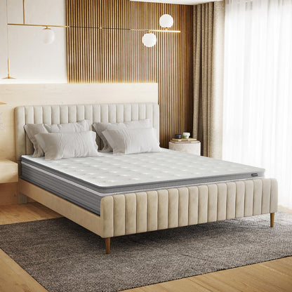 Oriona King 25cm Pocket Spring Gel Mattress in Medium Firm on a low platform bed, featuring a white quilted top, gray sides, and four pillows. Positioned within a modern bedroom setting.