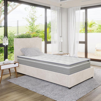Oriona King Single 25cm Pocket Spring Mattress in Med Firm on a sleek bed, showcasing its tufted surface and supportive design. Accompanied by a modern bedroom setting with minimalistic decor.