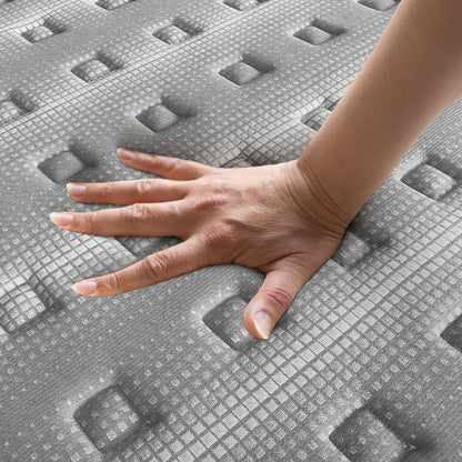 A hand presses into the textured surface of the Phoebe Queen 33cm Euro Pillow Top Pocket Spring Mattress, showcasing its responsive, grid-patterned memory foam cushioning for comfort and support.