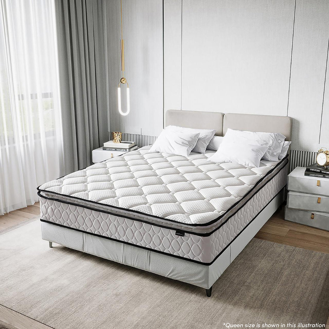 Venus Single 23cm Pillow Top Pocket Spring Mattress in Firm is topped on a queen bed, showcasing thick quilting and a low headboard, flanked by nightstands with books and decor.