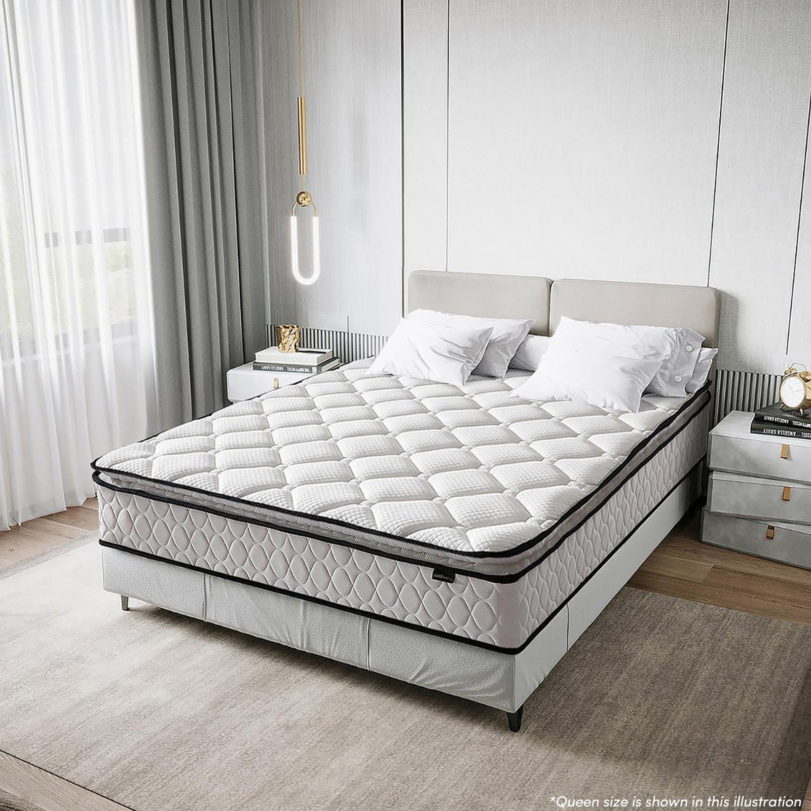 Venus Single 23cm Pillow Top Pocket Spring Mattress in Firm is topped on a queen bed, showcasing thick quilting and a low headboard, flanked by nightstands with books and decor.