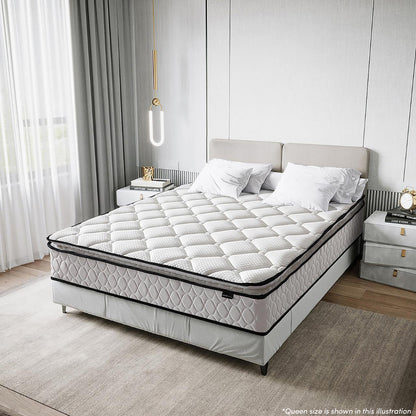 Venus Single 23cm Pillow Top Pocket Spring Mattress in Firm is topped on a queen bed, showcasing thick quilting and a low headboard, flanked by nightstands with books and decor.