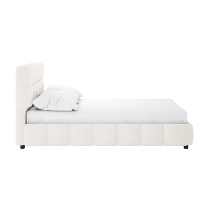 Nikias Double Boucle Fabric Bed Frame in Cream White features a plush, tufted headboard with bouclé upholstery, sleek side rails, and short dark legs, offering a contemporary, luxurious bedroom centerpiece.