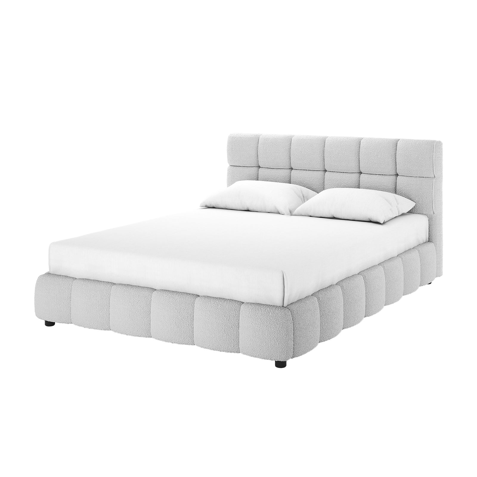 Nikias Queen Bouclé Fabric Bed Frame in Light Grey features a low-profile design with a tall, square-tufted headboard and matching pillows, all upholstered in textured light fabric, on short dark legs.