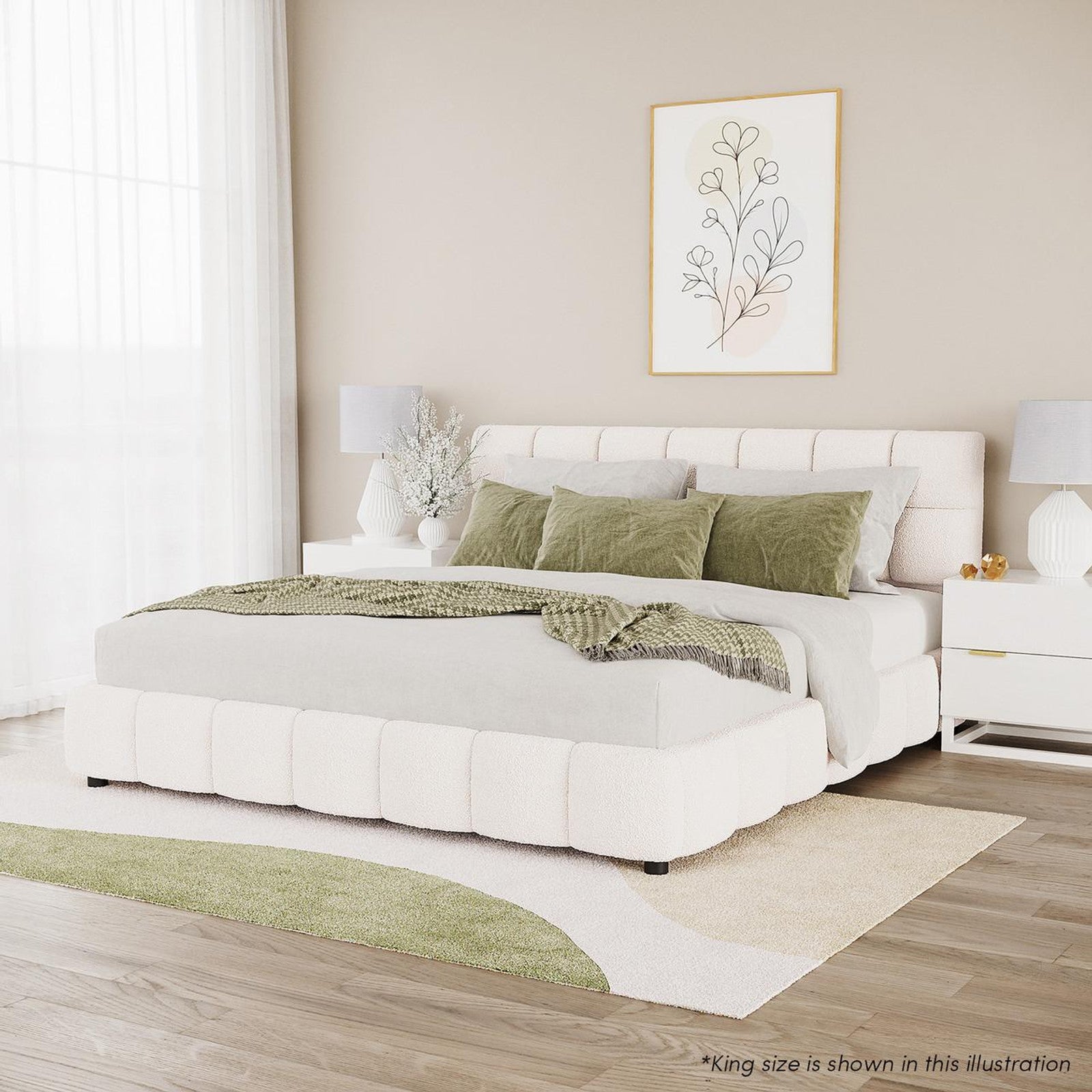 Nikias Super King Boucle Fabric Bed Frame in Cream White with tufted headboard, light-gray bedding, olive-green accents; flanked by white nightstands and floral decor against a beige wall.