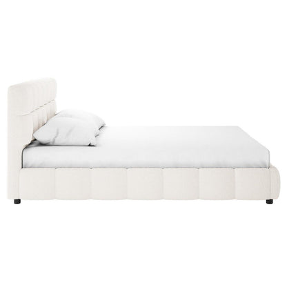 Nikias Super King Boucle Fabric Bed Frame in Cream White featuring a tall tufted headboard and low rounded base, dressed with a fitted white sheet and two pillows, offers a luxurious, modern design.