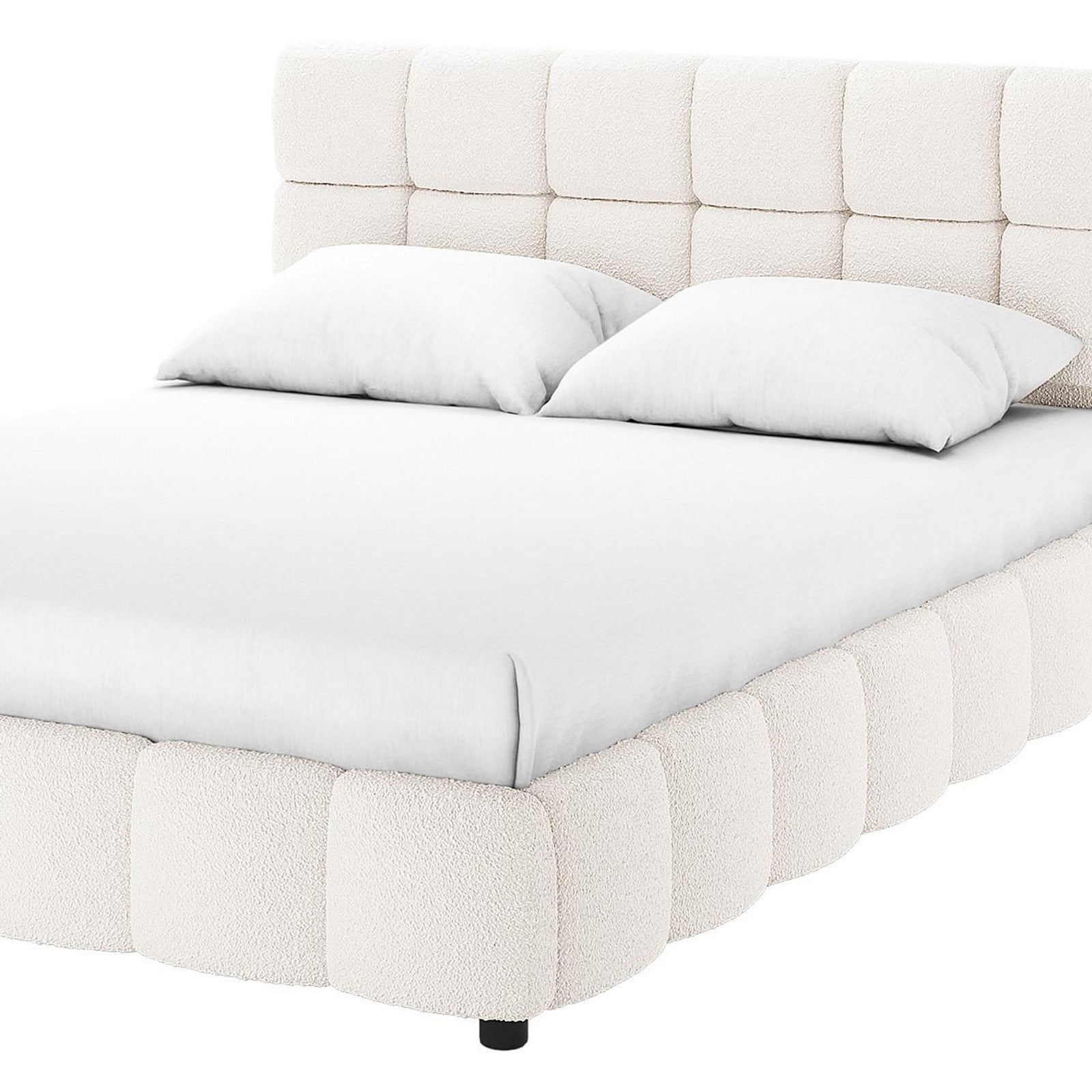 Nikias Super King Boucle Fabric Bed Frame in Cream White, featuring a low-profile design with a tufted, square-paneled headboard and sides in soft bouclé fabric, dressed with white bedding.
