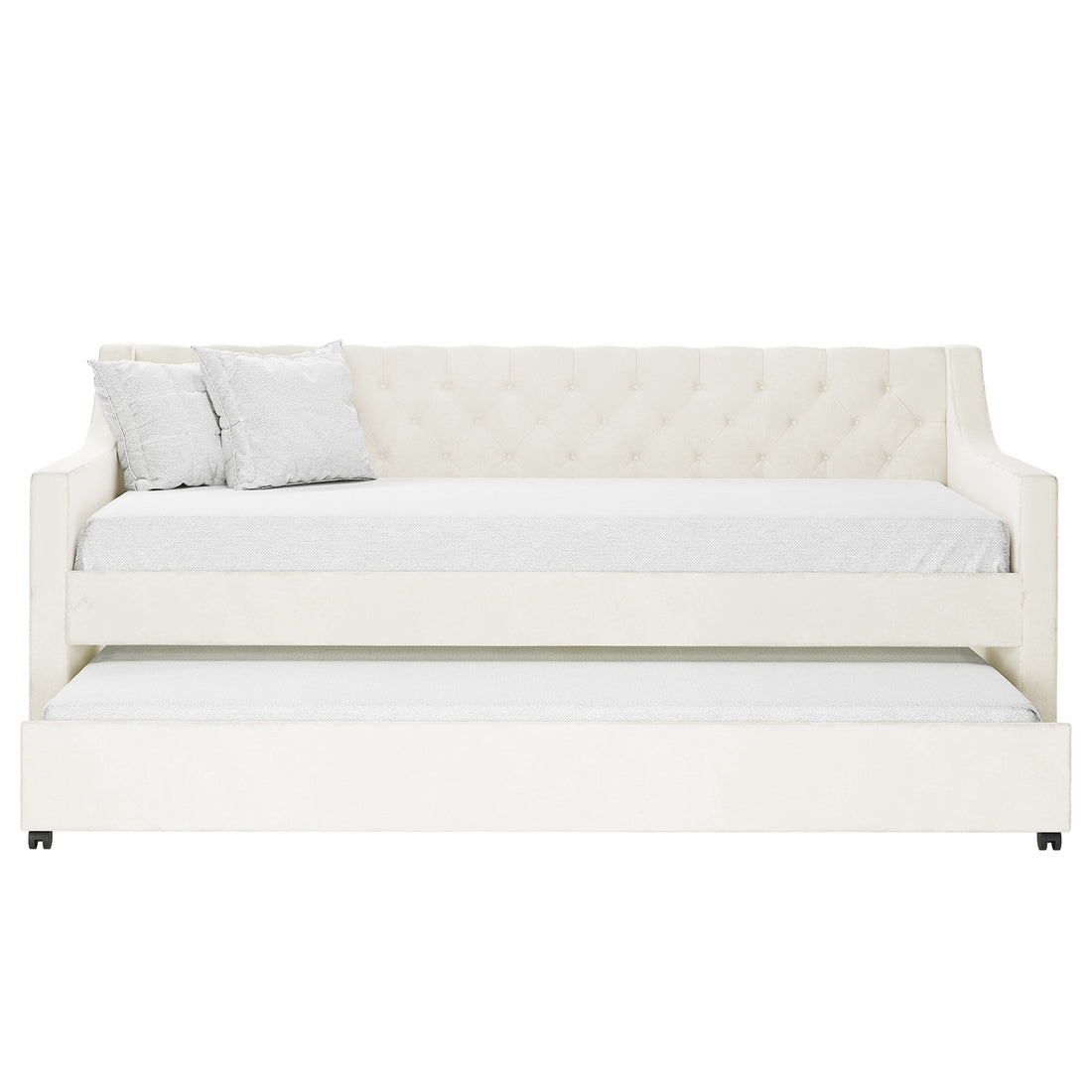Ovidia Velvet Single Sofa Daybed with Trundle in Cream White features a tufted backrest, sloped arms, matching pillows, and a pull-out trundle, offering stylish, space-saving functionality.