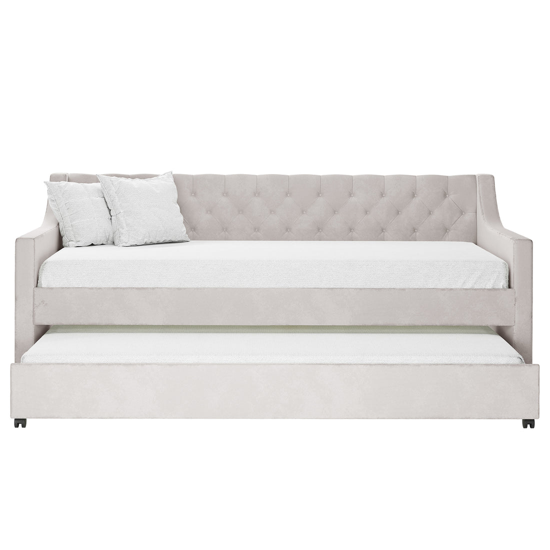 Ovidia Velvet Single Sofa Daybed with Trundle in Light Grey, featuring a tufted backrest, low arms, matching throw pillows, and a pull-out trundle for additional sleeping space.