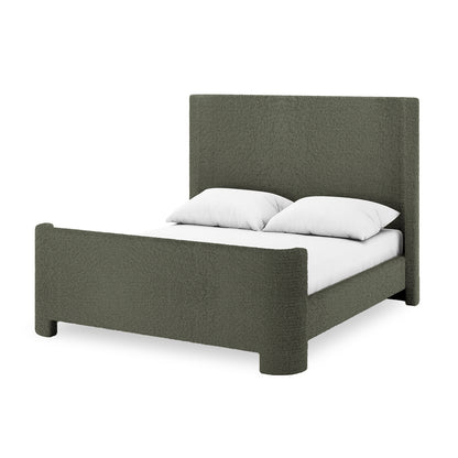 Palmira Double Boucle Fabric Bed Frame in Dark Green features a tall headboard, low footboard, and short legs. Upholstered in dark, textured fabric with white bedding, it exudes elegance and sophistication.
