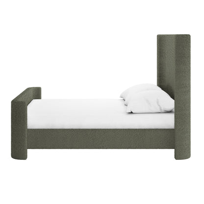 Palmira Double Boucle Fabric Bed Frame in Dark Green, featuring a low-profile platform, tall rectangular headboard, and blocky footboard. Upholstered in textured fabric with white linens and pillows, set against a white background.