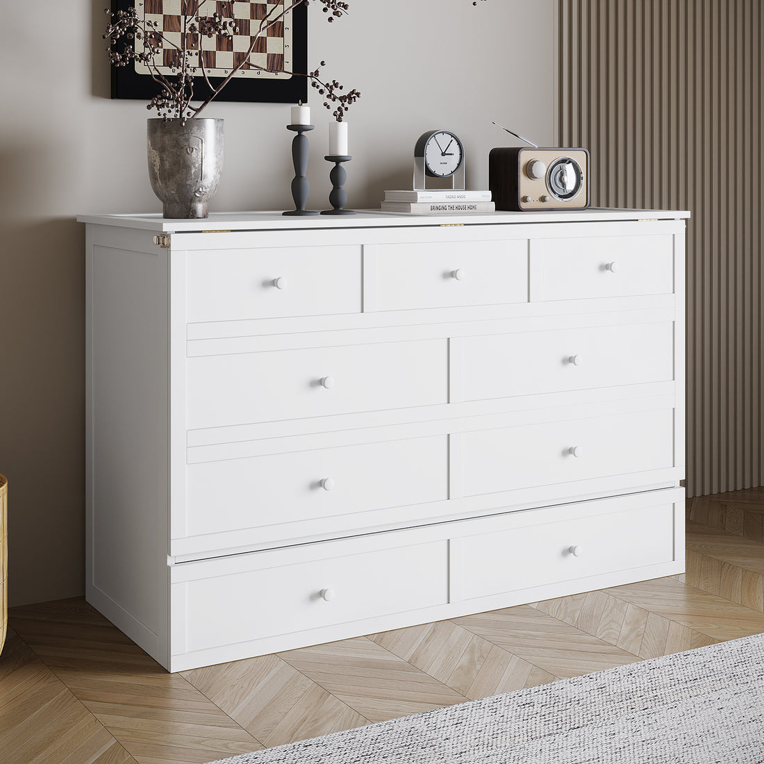 A stylish interior corner showcasing the Flecter 3-Fold Queen Mattress with Penn Smart Queen Murphy Bed, emphasizing its modern design and space-saving functionality amid chic decor elements like a dresser and decorative accents.