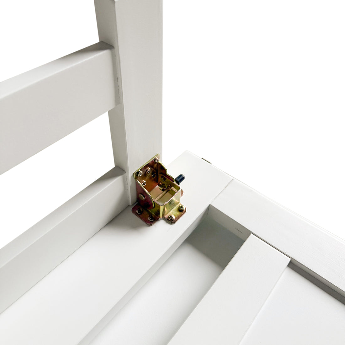 Close-up of the metal folding hinge mechanism on the white Murphy bed frame, showing sturdy construction