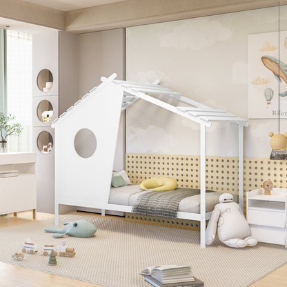 Quinta Single Solid Pine Wood Kids Bed White with an A-frame roof and porthole, featuring a grey/green plaid blanket and yellow bolster, set in a playful children's room.