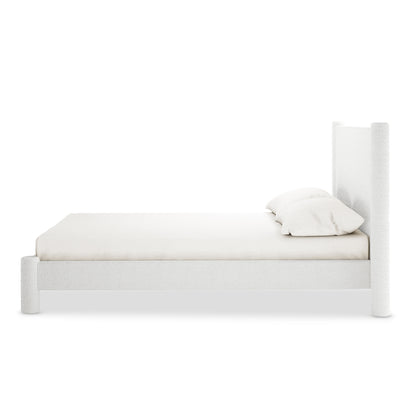 Rhoda Double Boucle Fabric Bed Frame in Cream White features a low-profile, upholstered platform with a tall, curved headboard, plush fabric texture, and a solid wood frame, showcasing modern elegance.