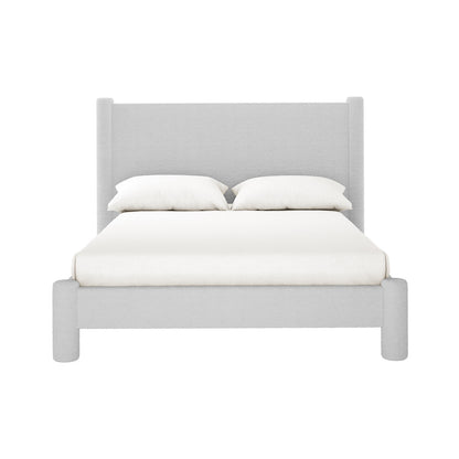 Rhoda Double Boucle Fabric Bed Frame in Light Grey features a modern upholstered design with a tall, curved headboard and low footboard, adorned with white bedding and two pillows, set against a plain background.