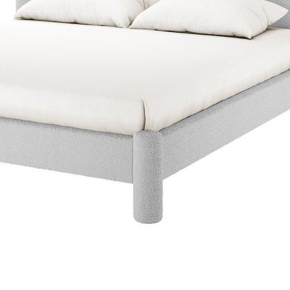 Rhoda King Boucle Fabric Bed Frame in Light Grey features a lightly textured upholstered platform with short cylindrical legs, topped with a fitted mattress and pillows, showcasing contemporary elegance and plush comfort.