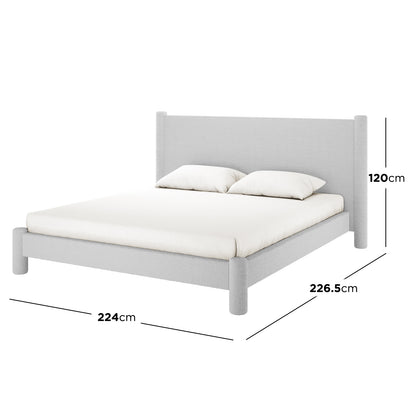 Rhoda King Boucle Fabric Bed Frame in Light Grey, showcasing an upholstered platform with a plush curved headboard, mattress, and pillows. Dimensions: 224x226.5x120 cm, emphasizing spacious comfort and contemporary elegance.