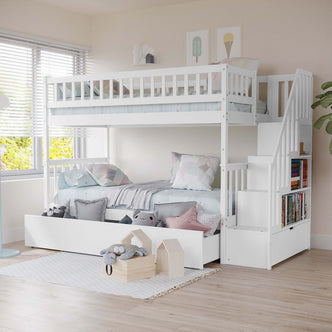Sabbie Hardwood Single Storage Bunk Bed in White with top safety rails, pastel pillows, pull-out trundle, staircase with storage, and minimalist decor, perfect for space-saving and stylish kids’ rooms.