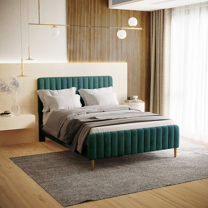 Seneca Upholstered Velvet Bed - Green Double features a channel-tufted design in deep teal velvet with a light wood headboard, styled in a contemporary bedroom with matching nightstand and gold pendant lights.
