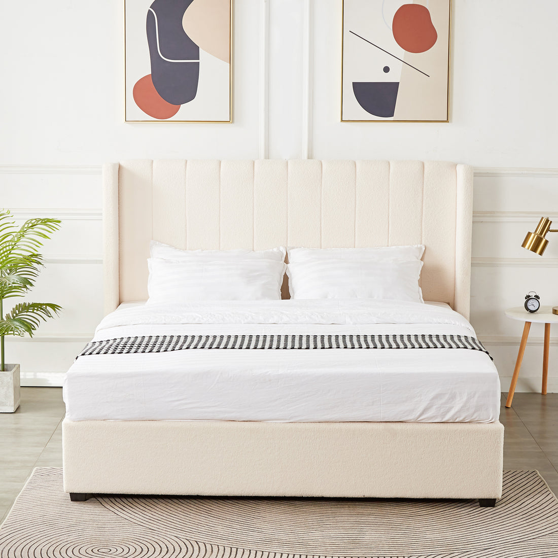 Septima & Fulvia Boucle King Bed Base & Winged Headboard in Cream White, featuring a tall padded headboard, low platform base, with white bedding, black-and-white runner, and elegant bedroom accents.