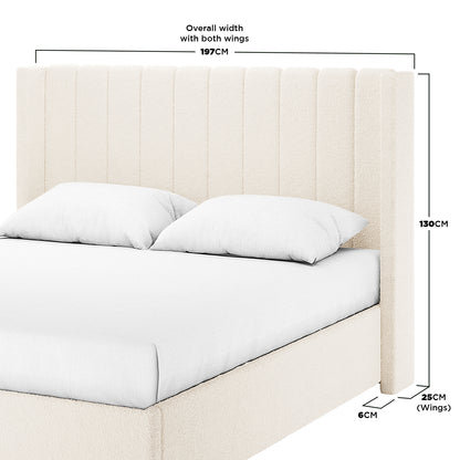 Septima & Fulvia Boucle King Bed Base & Winged Headboard in Cream White, featuring a cream-colored, channel-tufted wingback headboard with matching wings, on a low-profile frame with white bedding.