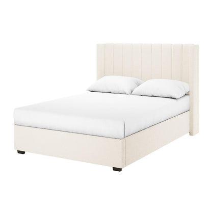 Septima & Fulvia Bouclé Queen Bed Base & Headboard in Cream White, showcasing a tall tufted headboard, low footboard, and short dark wood feet, dressed in white bedding and pillows.