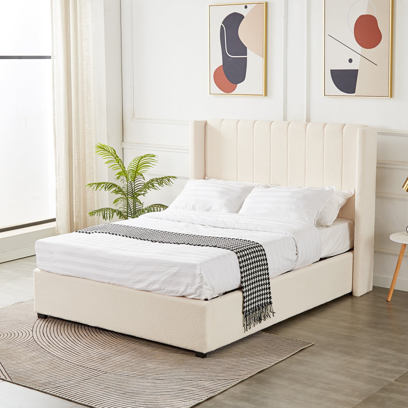 Septima & Fulvia Bouclé Queen Bed Base & Headboard in Cream White, featuring a tall channel-tufted headboard, upholstered design, and elegant minimalist style. Accented with a houndstooth throw and abstract prints.