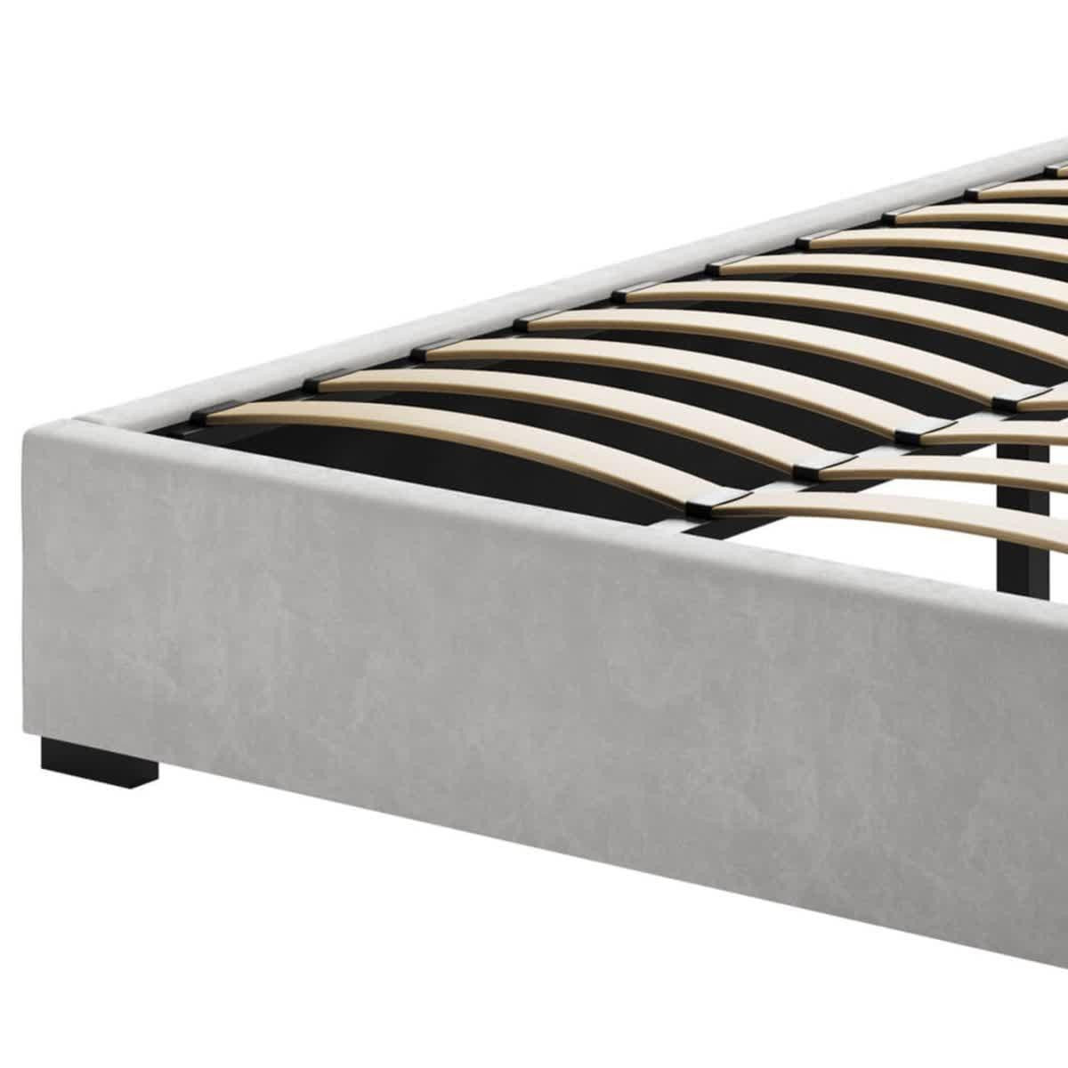 Septima & Gratiana Double Bed & Headboard Package – Slate features a slatted bed frame with a light grey upholstered side panel, curved wooden slats, and square metal legs for mattress support.