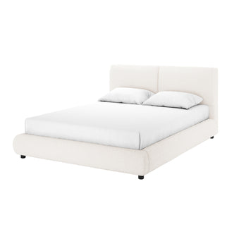Stacy Queen Boucle Bed Frame in Cream White features a low-profile design with an upholstered frame and headboard, adorned with a white mattress and pillows for a minimalist, elegant look.