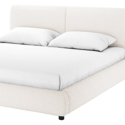 Stacy Queen Boucle Bed Frame in Cream White, featuring a modern upholstered platform design with a padded headboard in vertical panels, matching rails, and short black legs, showcasing elegance and comfort.