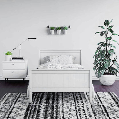 Tertia Solid Pine Timber Bed Frame King Single, showcasing solid construction with engineered wooden slats. Featured in a stylish, modern bedroom setting, emphasizing its robust design and suitability for restful sleep.