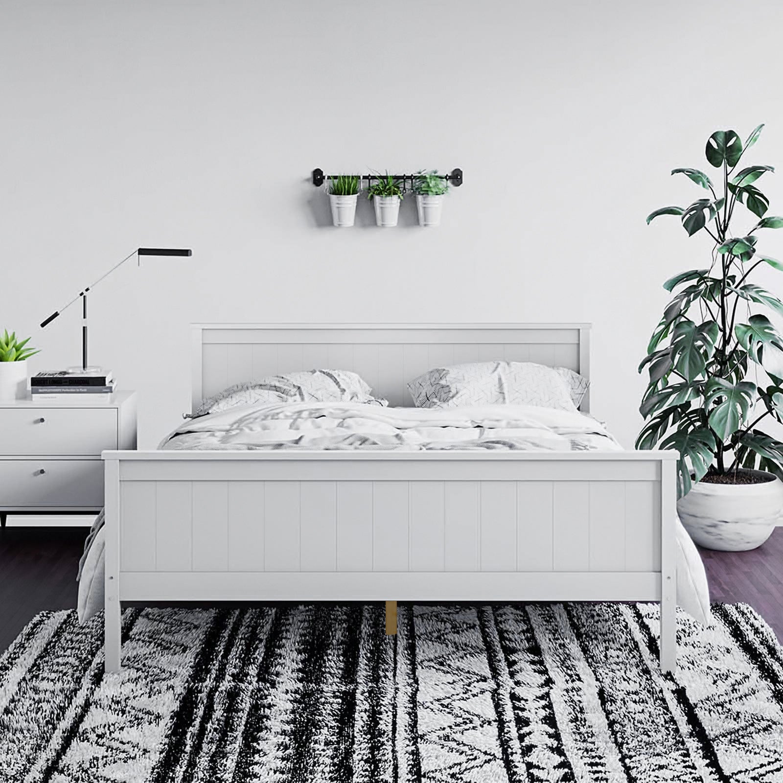 Tertia Solid Pine Timber Bed Frame Queen in a cozy bedroom setting, highlighted by its sturdy solid pine construction and elegant design, framed by pillows and interior decor elements.