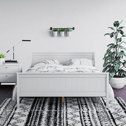 Tertia Solid Pine Timber Bed Frame Queen in a cozy bedroom setting, highlighted by its sturdy solid pine construction and elegant design, framed by pillows and interior decor elements.