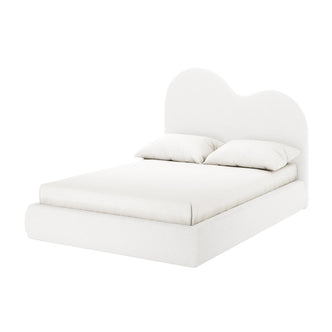 Thales Double Curved Boucle Fabric Bed Frame in Cream White features a heart-shaped headboard and white upholstery, with white bedding and pillows, set against a plain white background.